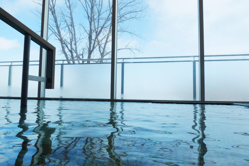 Shin Furano Prince Hotel Exterior photo A view of the indoor pool